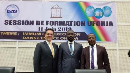 During the opening ceremony, from L. to R. : Mayatta Ndiaye Mbaye, Director General of Ersuma, Marc Schmitz, President of the UIHJ, Jean-Didier Bidié, Vice-President of the UIHJ, President of the National Chamber of the Judicial Officers of Congo