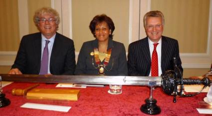 From L. to R. : Leo Netten President of the UIHJ, Dorothy Love, President of the Society of Messengers-at-Arms and Sheriff Officers, James Taylor, Sheriff Principal of Glasgow and Strathkelvin